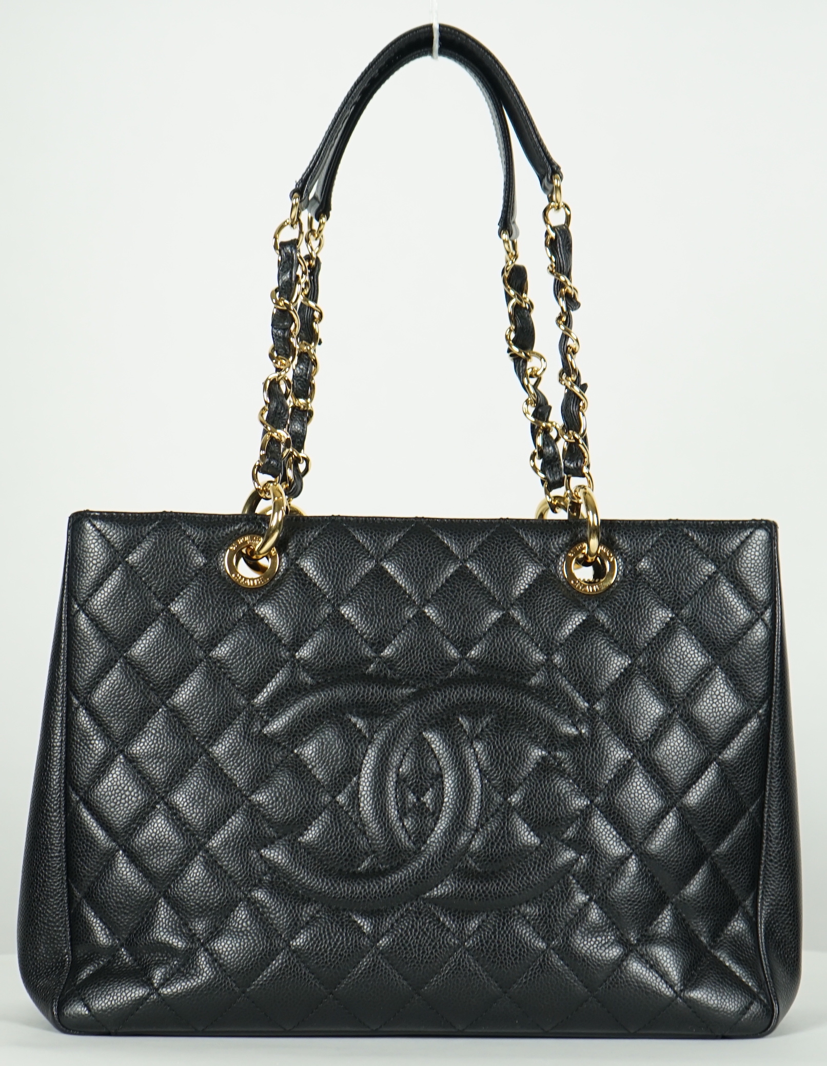 A Chanel vintage black quilted Caviar Timeless Grand Shopping Tote, width 34.5cm, height 25cm, height overall 47cm, depth 13cm, Please note this lot attracts an additional import tax of 20% on the hammer price